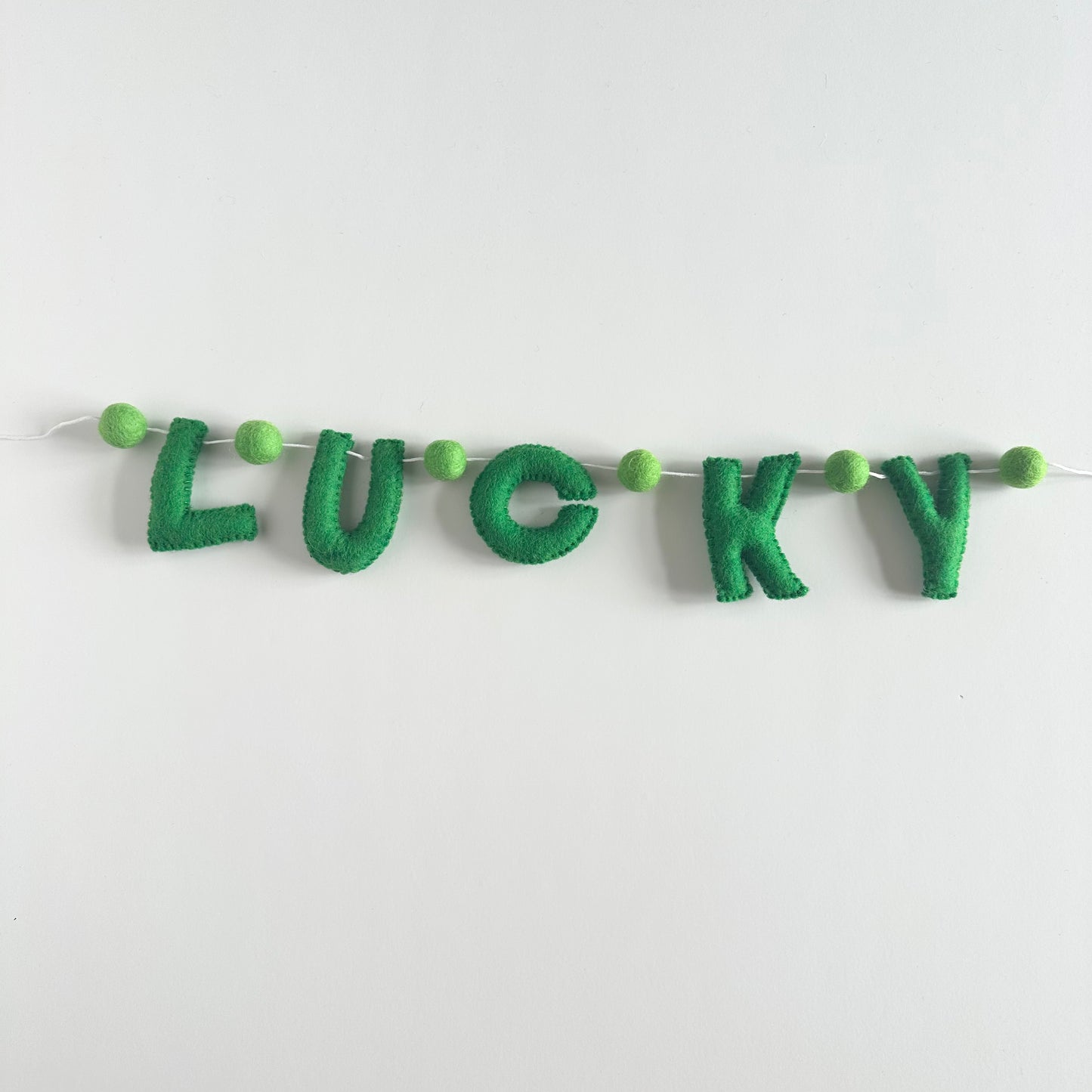 LUCKY felt banner - emerald letters