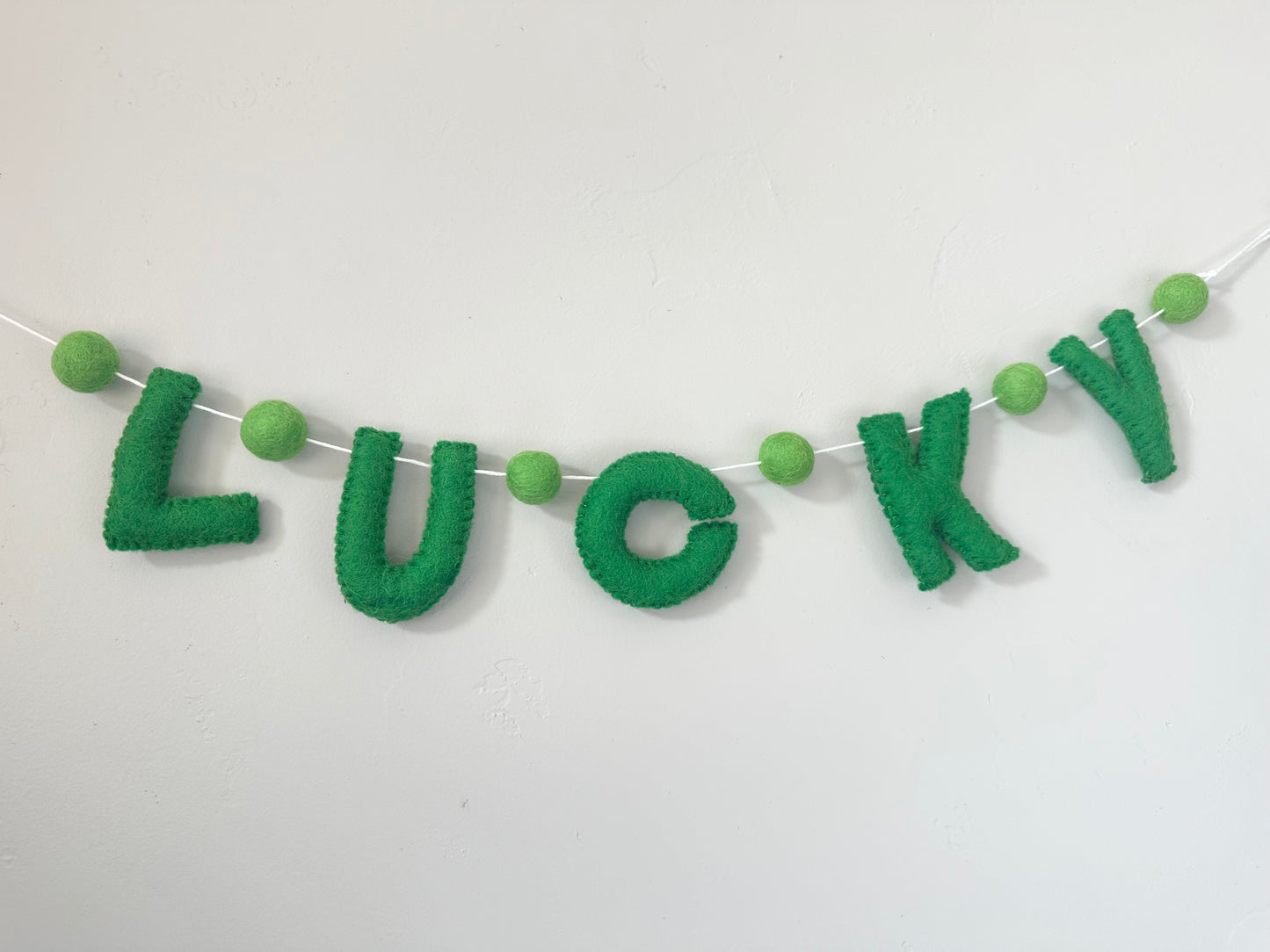 LUCKY felt banner - emerald letters