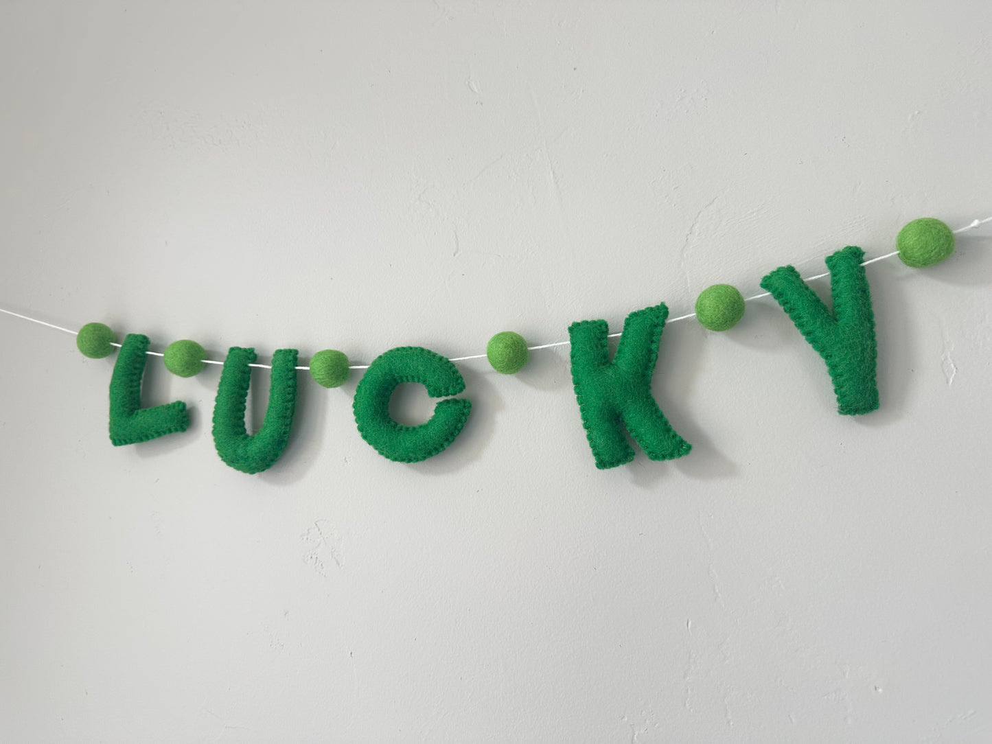 LUCKY felt banner - emerald letters