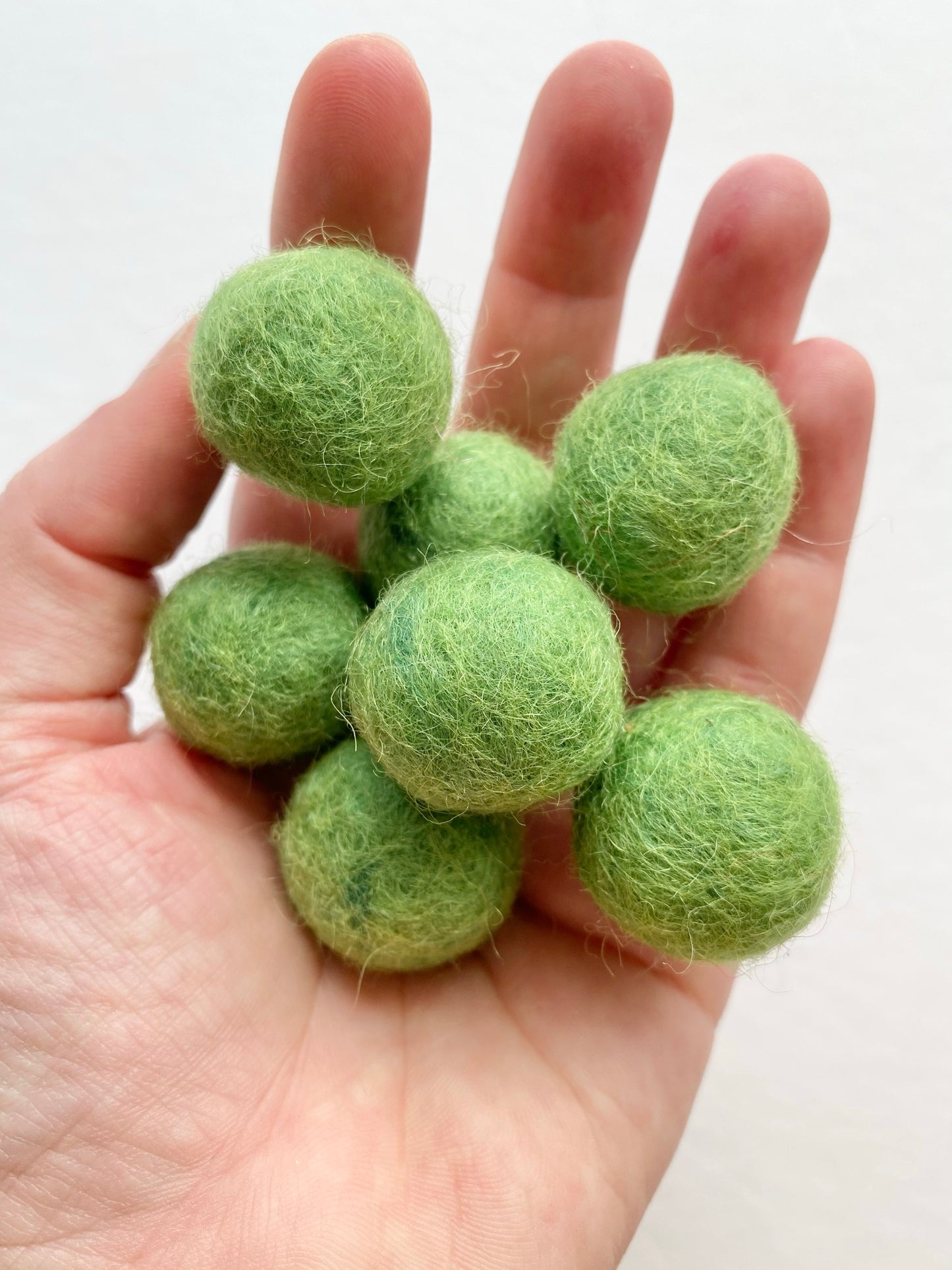 grass green felt poms