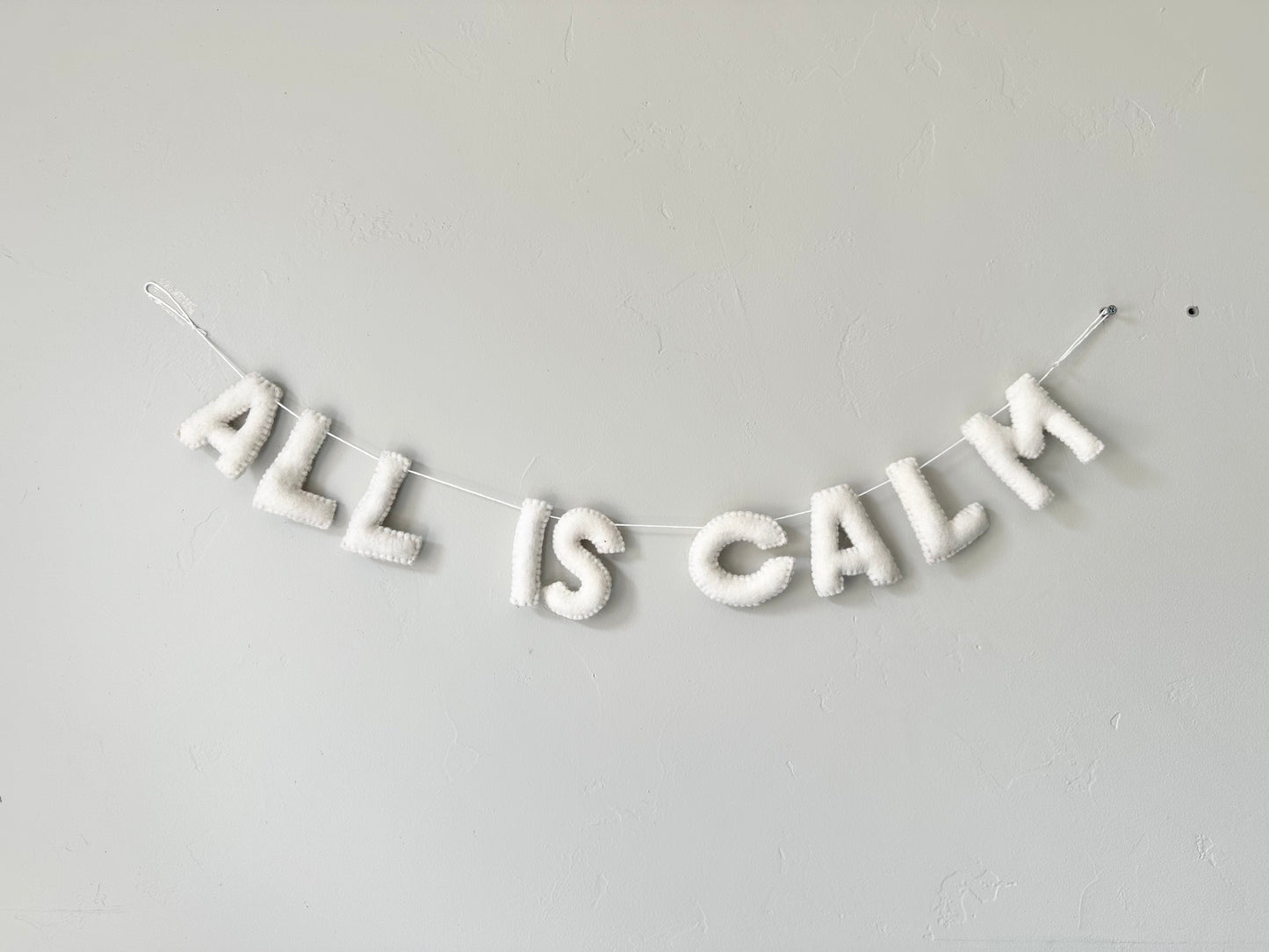 ALL IS CALM felt banner - white letters