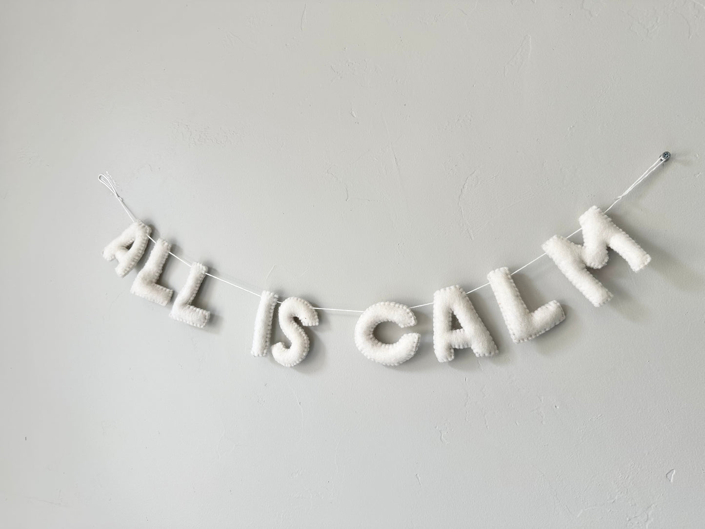ALL IS CALM felt banner - white letters