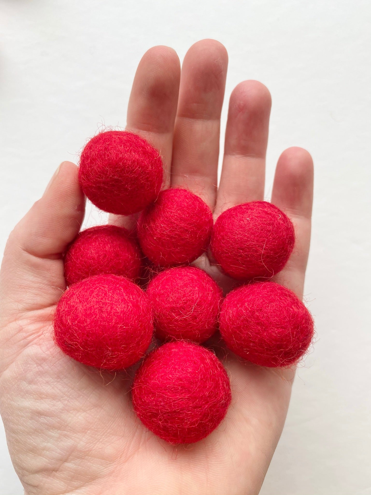 red felt poms