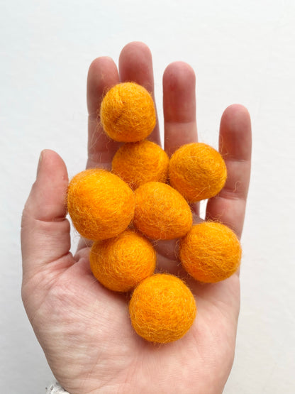 orange wool balls