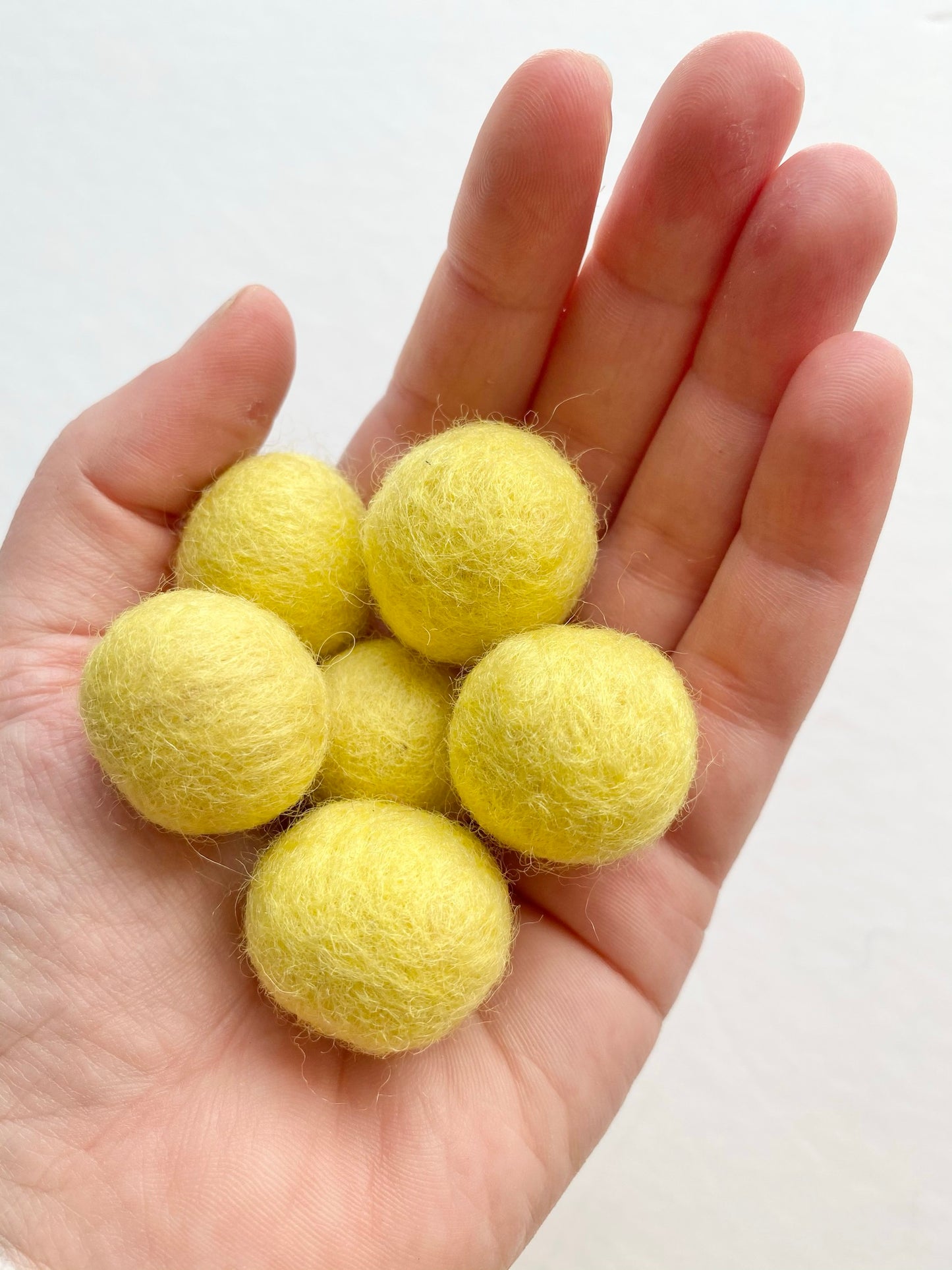 yellow felt balls