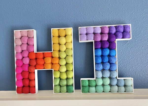 felt ball hi letters in rainbow ombre from wool jamboree